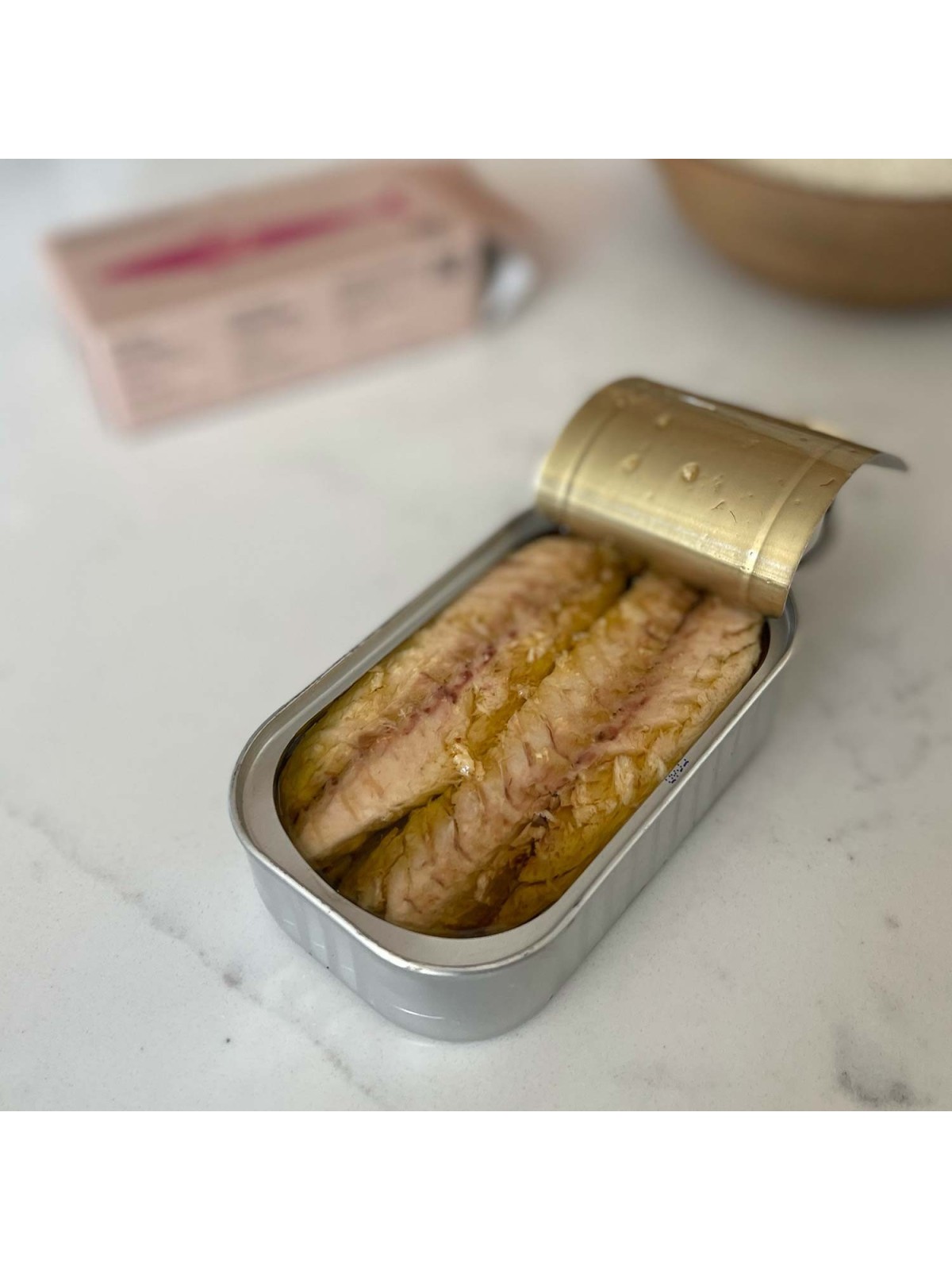 Opened tin of fillets