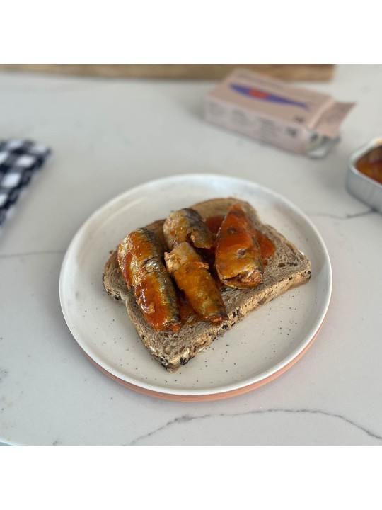  Opened tin of sardines in tomato